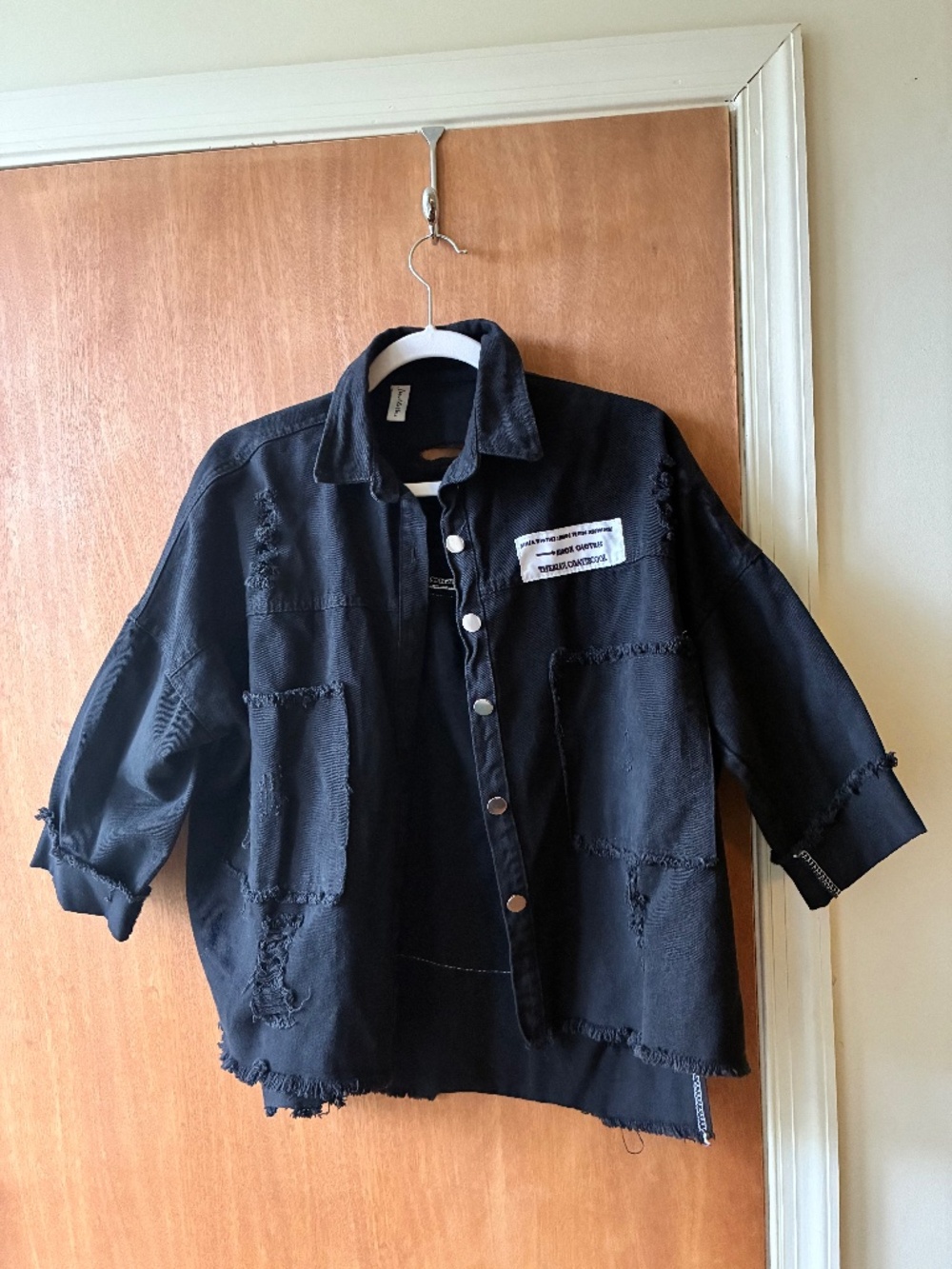 Black denim distressed jacket from Jiao Ma Hua, one size